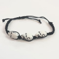 Triple White Skull - Corded Bracelet